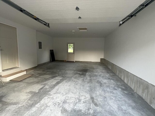 spare room with concrete floors