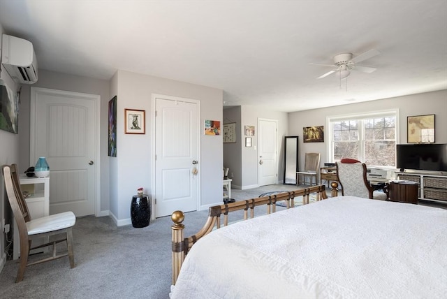 carpeted bedroom with a wall unit AC and baseboards