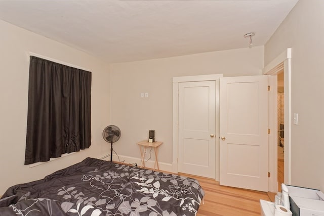 bedroom featuring light hardwood / wood-style floors