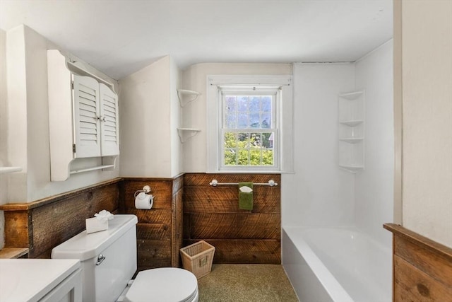 full bath with toilet and vanity