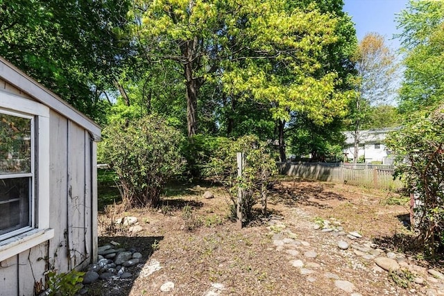 view of yard with fence