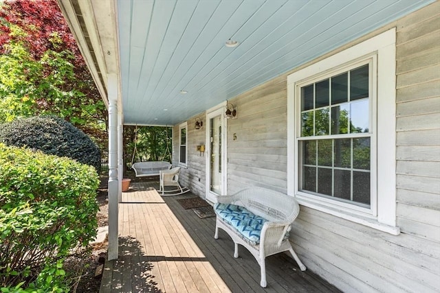 wooden terrace with covered porch