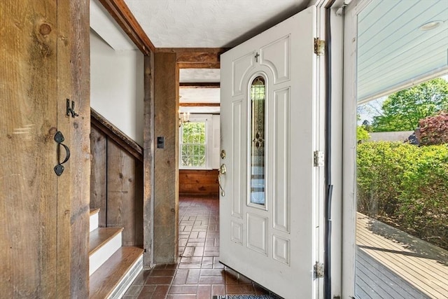 foyer entrance featuring stairway