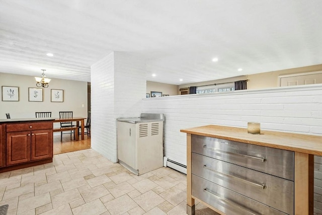 70 Donna Rd, Framingham, MA 01701 - kitchen with a baseboard heating unit, a chandelier, recessed lighting, and wood counters