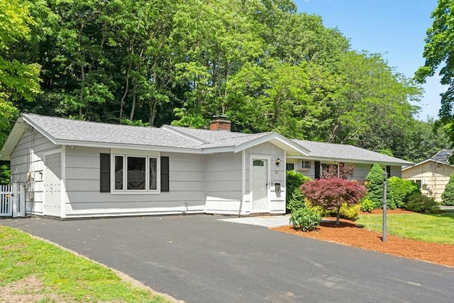 70 Donna Rd, Framingham, MA 01701 - ranch-style home with a chimney and a shingled roof