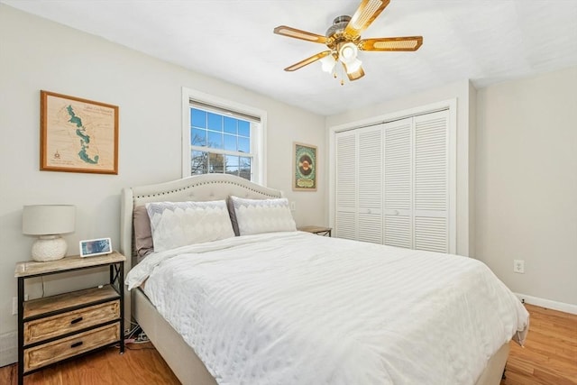 70 Donna Rd, Framingham, MA 01701 - bedroom with a closet, light wood finished floors, and a ceiling fan