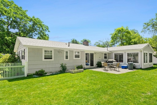 70 Donna Rd, Framingham, MA 01701 - back of property with a chimney, a patio area, and roof with shingles