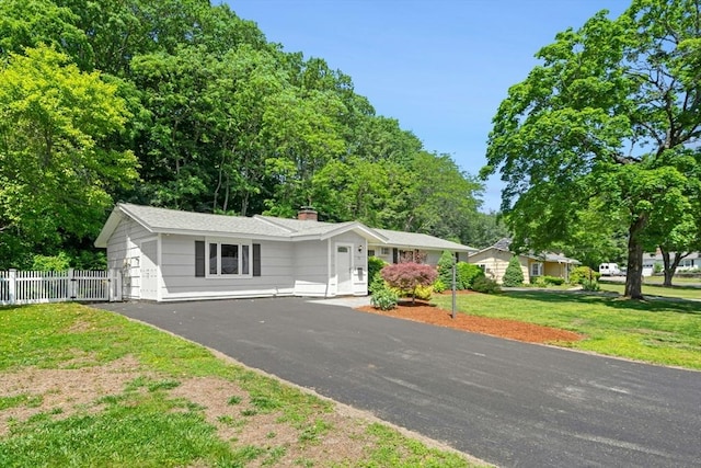 70 Donna Rd, Framingham, MA 01701 - single story home with a chimney