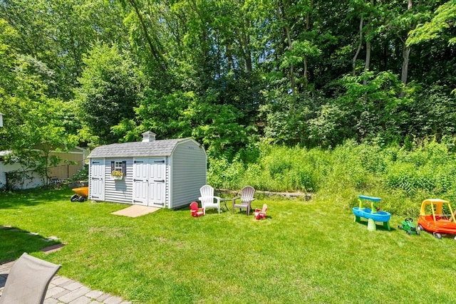 70 Donna Rd, Framingham, MA 01701 - view of green lawn featuring a storage unit
