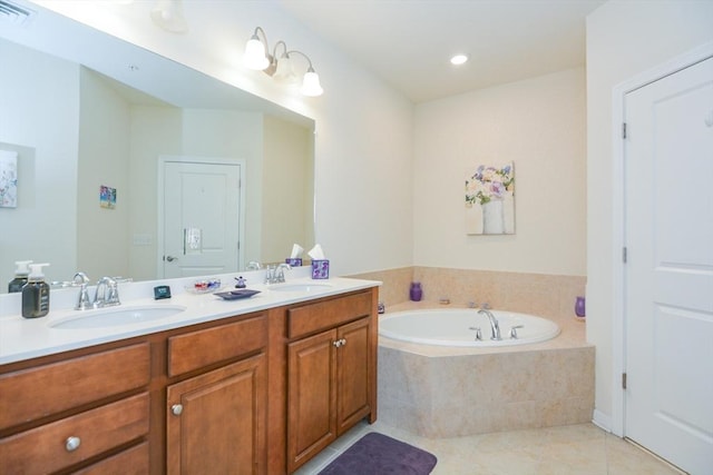 62 Abigail Way Unit 2003, Reading, MA 01867 - bathroom with double vanity, tile patterned floors, and a bath