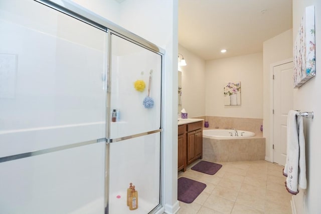 62 Abigail Way Unit 2003, Reading, MA 01867 - bathroom with a stall shower, a garden tub, vanity, tile patterned floors, and recessed lighting