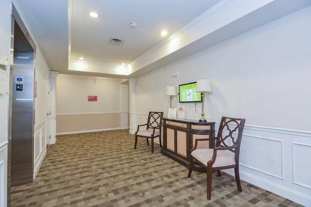 62 Abigail Way Unit 2003, Reading, MA 01867 - sitting room with a decorative wall, ornamental molding, decorative columns, carpet floors, and wainscoting
