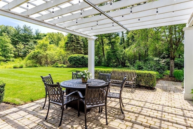 view of patio with outdoor dining space and a pergola
