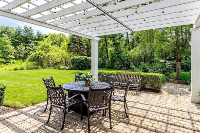 view of patio with a pergola and outdoor dining space
