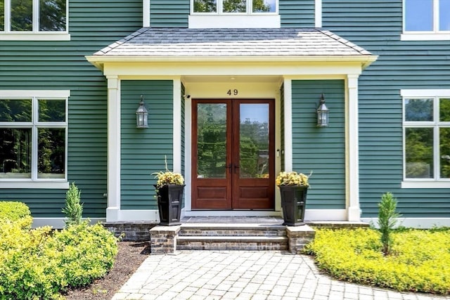 property entrance featuring french doors