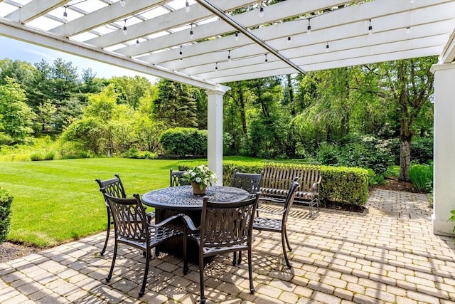 view of patio featuring outdoor dining area and a pergola