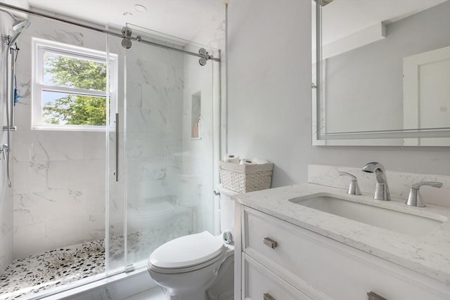 39 Pond St, Framingham, MA 01702 - full bathroom with toilet, a marble finish shower, and vanity