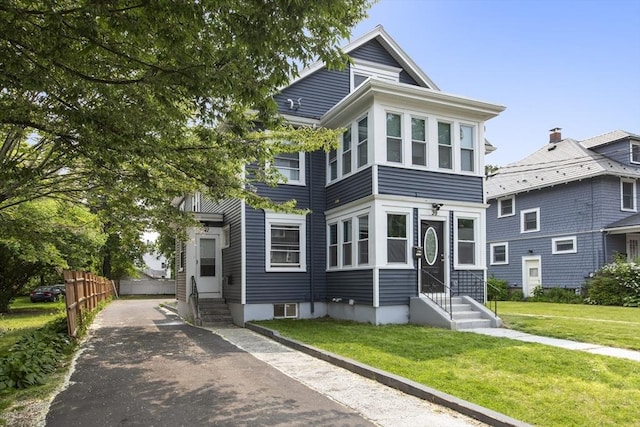 39 Pond St, Framingham, MA 01702 - view of front of home with entry steps and asphalt driveway