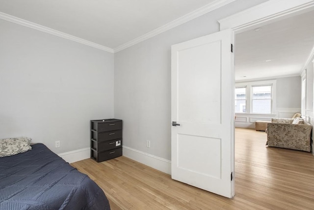 39 Pond St, Framingham, MA 01702 - bedroom featuring light wood-style flooring, ornamental molding, and baseboards