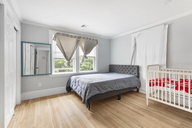 39 Pond St, Framingham, MA 01702 - bedroom with ornamental molding, baseboards, and wood finished floors
