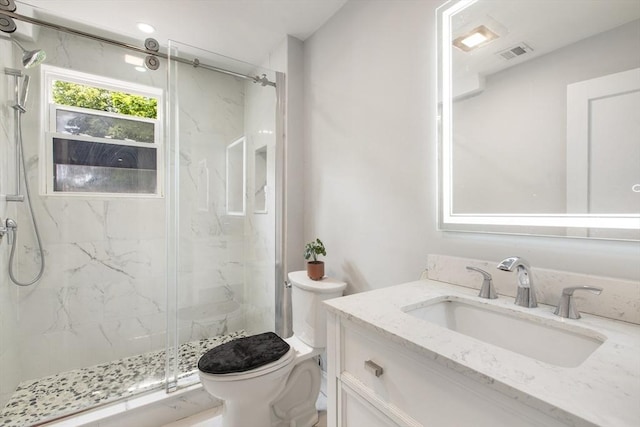 39 Pond St, Framingham, MA 01702 - full bath featuring a marble finish shower, toilet, and vanity