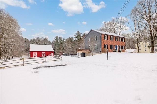 view of yard covered in snow