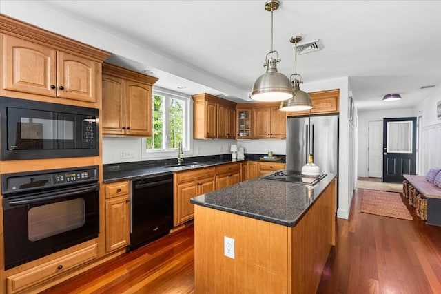 497 Long Pond Rd, Plymouth, MA 02360 - kitchen featuring black appliances, dark wood finished floors, a sink, hanging light fixtures, and glass insert cabinets