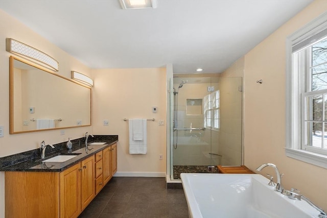 full bathroom with plenty of natural light, a sink, and a shower stall