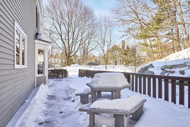 view of snow covered deck