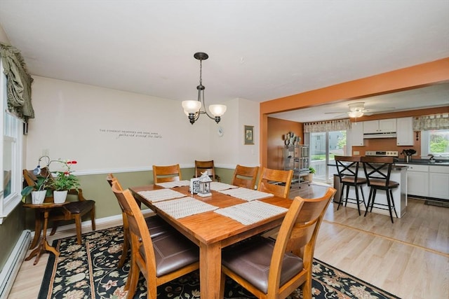 6 Gentry Ln, Taunton, MA 02780 - dining space with baseboard heating, light wood-style floors, and a ceiling fan