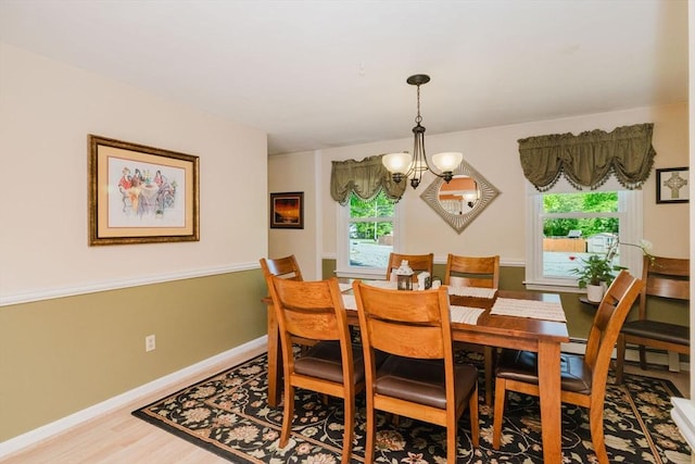 6 Gentry Ln, Taunton, MA 02780 - dining space featuring a chandelier, wood finished floors, and baseboards