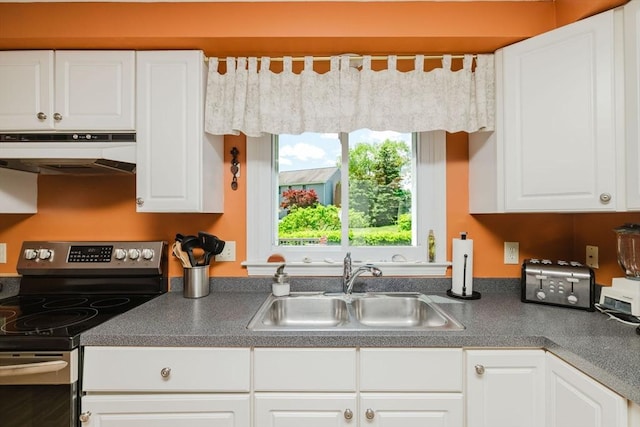 6 Gentry Ln, Taunton, MA 02780 - kitchen with electric stove, under cabinet range hood, a sink, and white cabinets