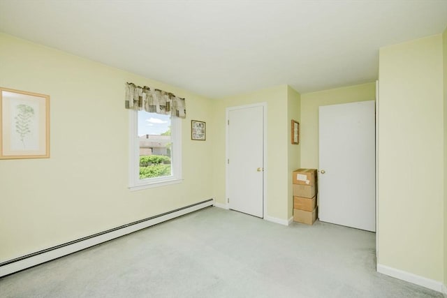 6 Gentry Ln, Taunton, MA 02780 - unfurnished bedroom with a baseboard heating unit, baseboards, and carpet flooring