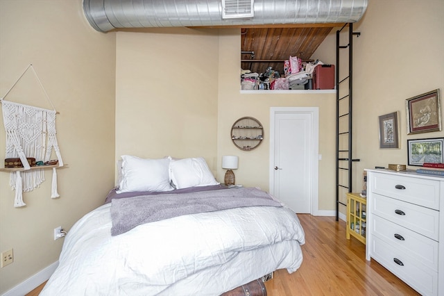 bedroom with light hardwood / wood-style floors