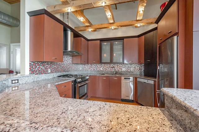 kitchen featuring light stone countertops, beamed ceiling, appliances with stainless steel finishes, and backsplash