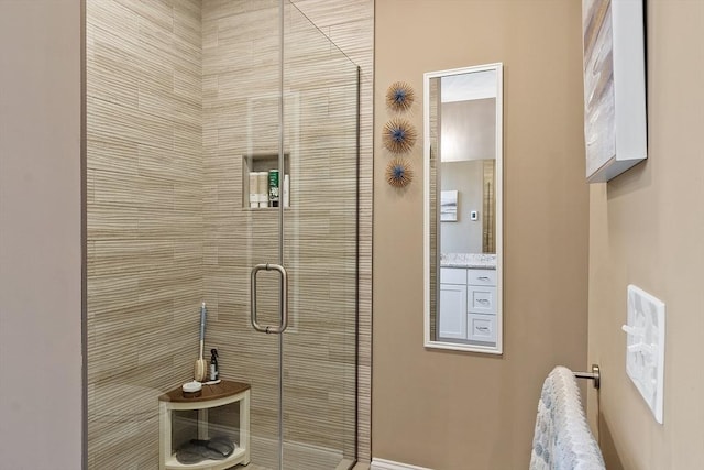 bathroom with a stall shower