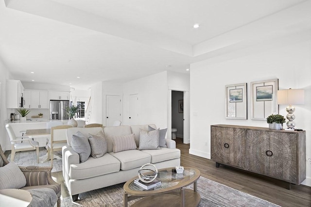 living room with dark wood-type flooring