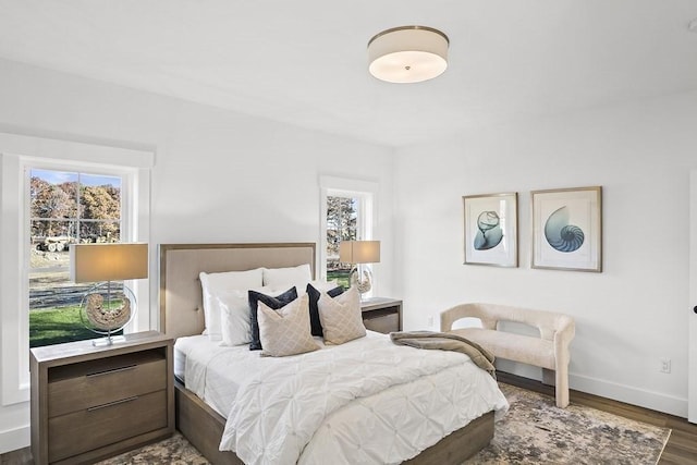 bedroom featuring dark wood-type flooring