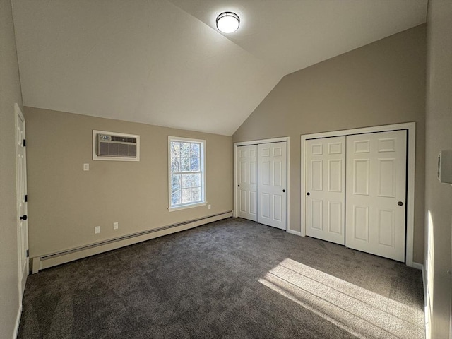 unfurnished bedroom with an AC wall unit, dark carpet, lofted ceiling, and a baseboard heating unit