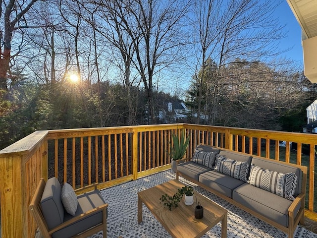 wooden deck with outdoor lounge area