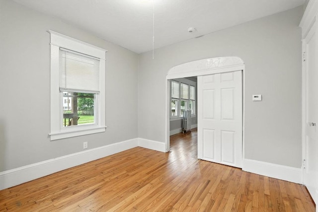 31-33 Dorset St, Springfield, MA 01108 - empty room featuring light wood finished floors and a smoke detector