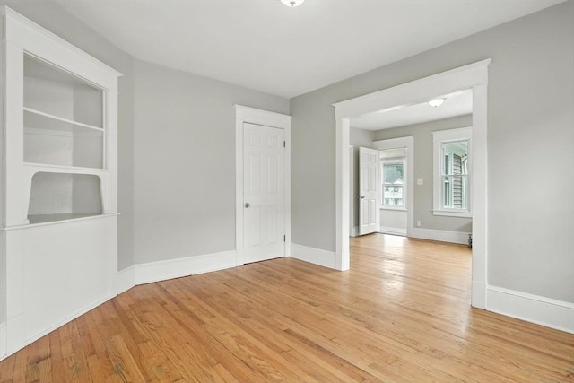 31-33 Dorset St, Springfield, MA 01108 - empty room with light wood-style floors and baseboards