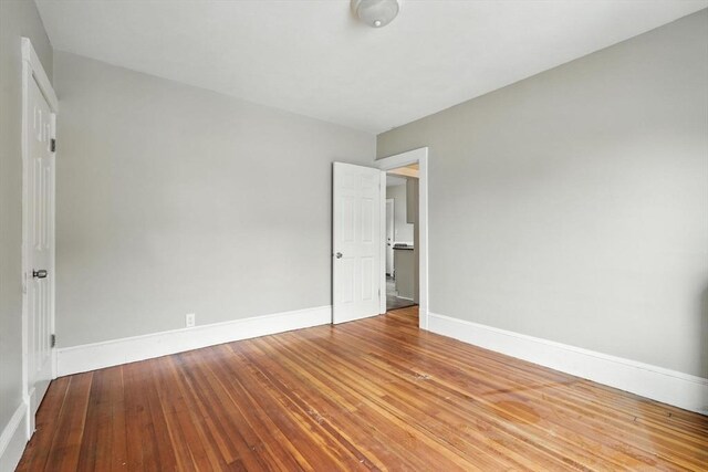 31-33 Dorset St, Springfield, MA 01108 - spare room featuring baseboards and hardwood / wood-style flooring