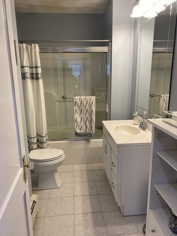 full bathroom with tile patterned floors, toilet, shower / tub combo, a baseboard radiator, and vanity