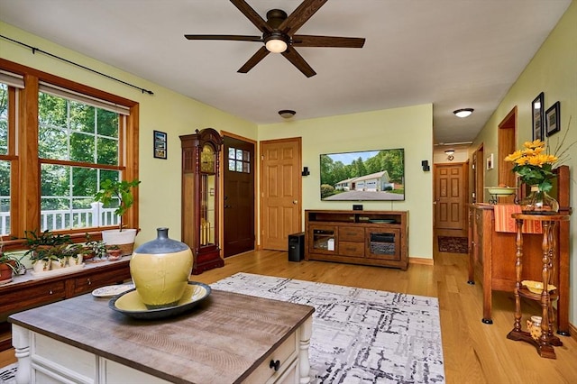 43 Ridge Rd, Erving, MA 01344 - living area with ceiling fan and light wood-style floors