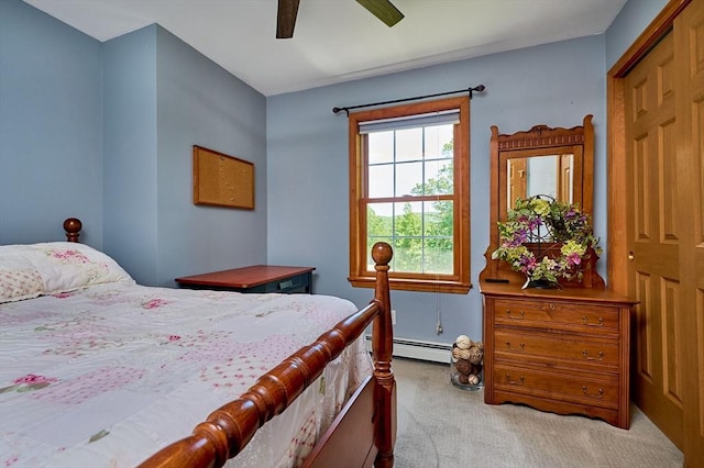 43 Ridge Rd, Erving, MA 01344 - carpeted bedroom with a baseboard heating unit and ceiling fan