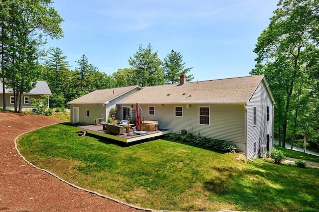 43 Ridge Rd, Erving, MA 01344 - back of property featuring a wooden deck, a lawn, and a chimney