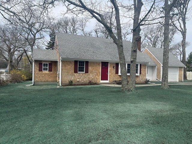 23 Town Hall Ave, Yarmouth, MA 02664 - single story home featuring a chimney, an attached garage, a shingled roof, and a front yard