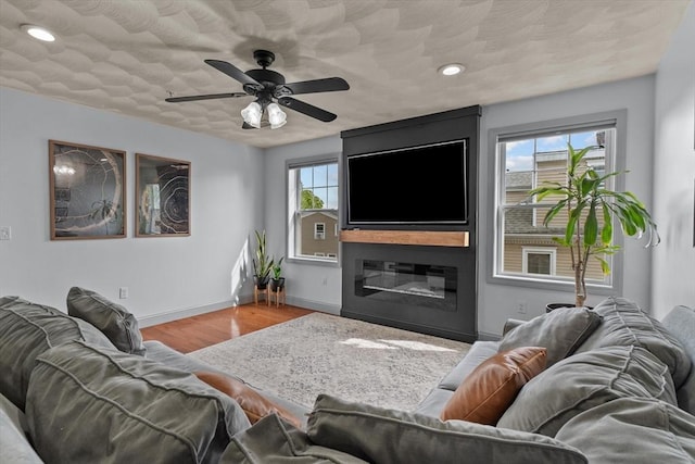 12 School St Unit 3, Salem, MA 01970 - living room with wood finished floors, a ceiling fan, baseboards, and recessed lighting