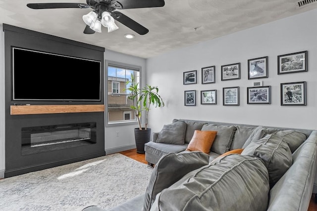 12 School St Unit 3, Salem, MA 01970 - living area featuring wood finished floors, recessed lighting, ceiling fan, and baseboards